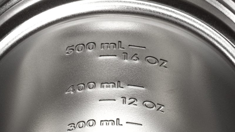 The Stanley Activate Shaker Bottle 20 oz in matte black, stainless steel insulated body, fast-flow spout, base container for supplements, and soft ergonomic carry handle.