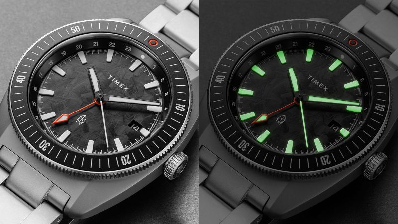 The James Brand × Timex Automatic GMT Nocturne Edition watch with carbon fiber dial, stainless-steel case, and ceramic bezel.