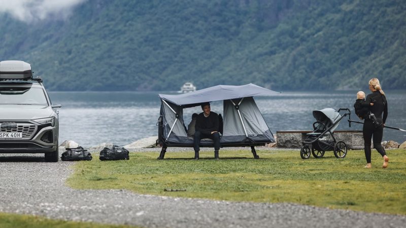 The Thule Outset hitch-mounted car tent attaches to an SUV’s receiver hitch, and is elevated off the ground with panoramic windows and a built-in mattress.