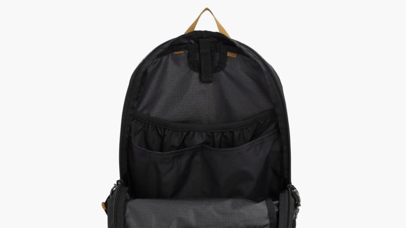A lightweight, weather-resistant backpack designed for travel and everyday versatility, featuring durable recycled nylon, streamlined storage, and a compact foldable design for on-the-go adventures.