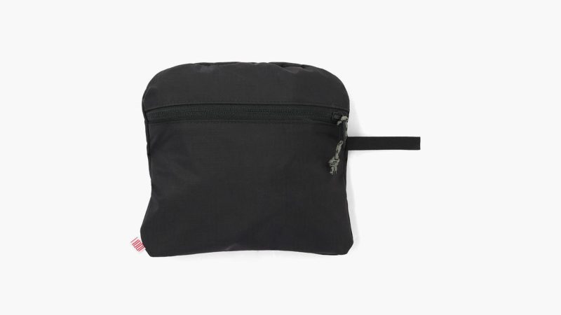 A lightweight, weather-resistant backpack designed for travel and everyday versatility, featuring durable recycled nylon, streamlined storage, and a compact foldable design for on-the-go adventures.