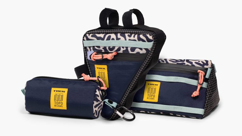 Trek x Topo Designs Project One ICON Checkmate Gravel Bike, featuring bold patterns and rugged outdoor performance, with bags.