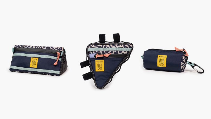 Trek x Topo Designs Project One ICON Checkmate Gravel Bike, featuring bold patterns and rugged outdoor performance, with bags.