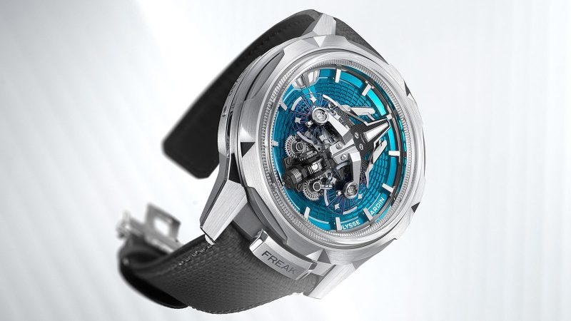 The Ulysse Nardin Freak S Enamel is available in ruby red and turquoise blue, with a titanium case and dual-oscillator movement visible under a domed sapphire crystal.
