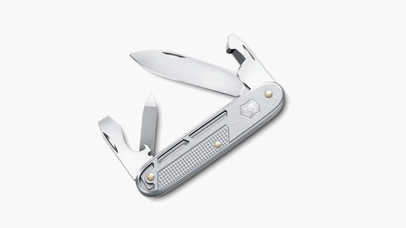 Victorinox Alox Refined Collection pocket knives in red, blue, and silver with skeletonized Alox scales and deep-carry clip.