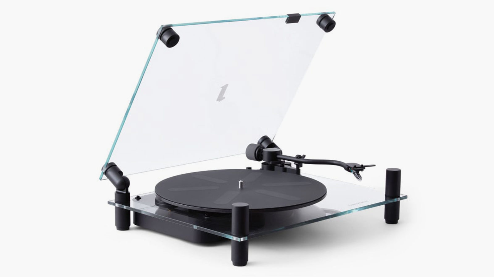 Transparent Turntable, a minimalist glass and aluminum record player crafted for design-minded men who value modern aesthetics.