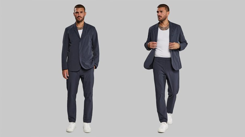 The Vollebak Neo Suit in black Cordura features four-way stretch, water repellence, and minimalist design with hidden zippers and articulated tailoring.