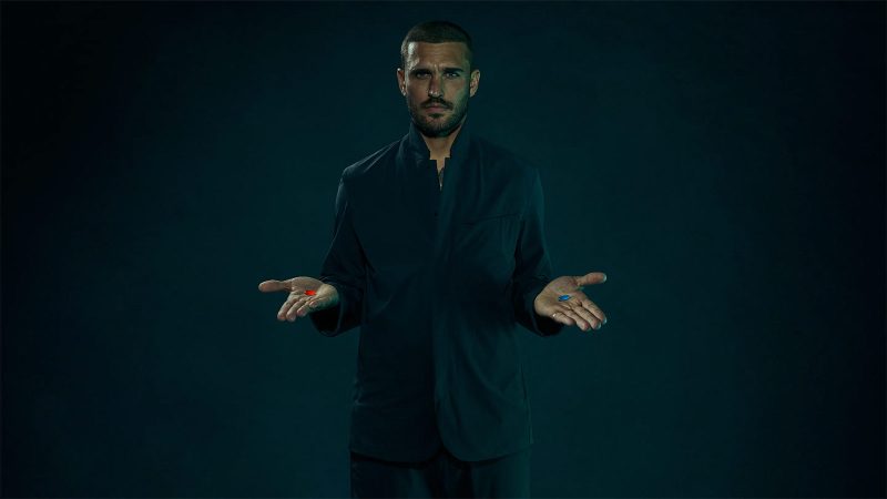 The Vollebak Neo Suit in black Cordura features four-way stretch, water repellence, and minimalist design with hidden zippers and articulated tailoring.