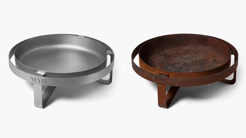 The YETI Fire Pit boasts a durable stainless steel design and an advanced airflow system, perfect for outdoor gatherings and cooking.