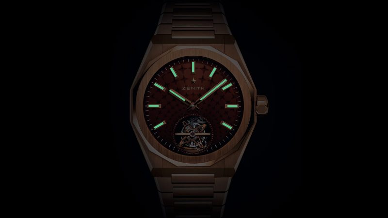 The Zenith DEFY Skyline Tourbillon in rose gold with brick-red dial and visible tourbillon aperture at 6 o’clock.