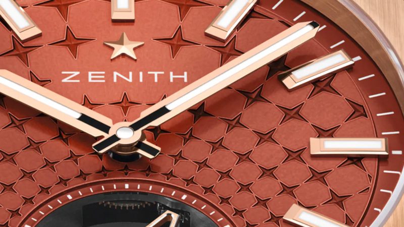 The Zenith DEFY Skyline Tourbillon in rose gold with brick-red dial and visible tourbillon aperture at 6 o’clock.