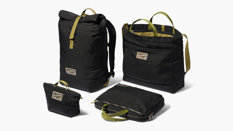 The Barebones Mōdeer Collection features a rolltop backpack, work tote, crossbody organizer, and zip pouch in recycled waxed canvas with metal hardware.