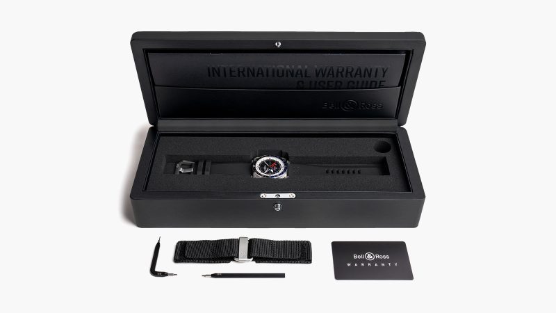 The Bell & Ross BR-03 GMT Compass watch with a square steel case, a black dial, a dual-color 24-hour bezel, and a red GMT hand.