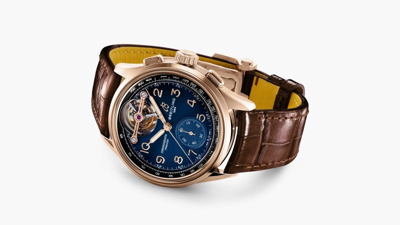 The Breitling Premier B21 Chronograph Tourbillon 42 Limited Edition shows a blue gradient dial and a gold tourbillon bridge.