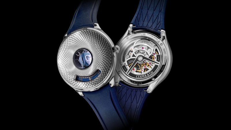 Czapek Time Jumper watch with jump-hour display, Singularité guilloché cover, caliber 10.01 movement, flying tourbillon, and stainless steel half-hunter case.