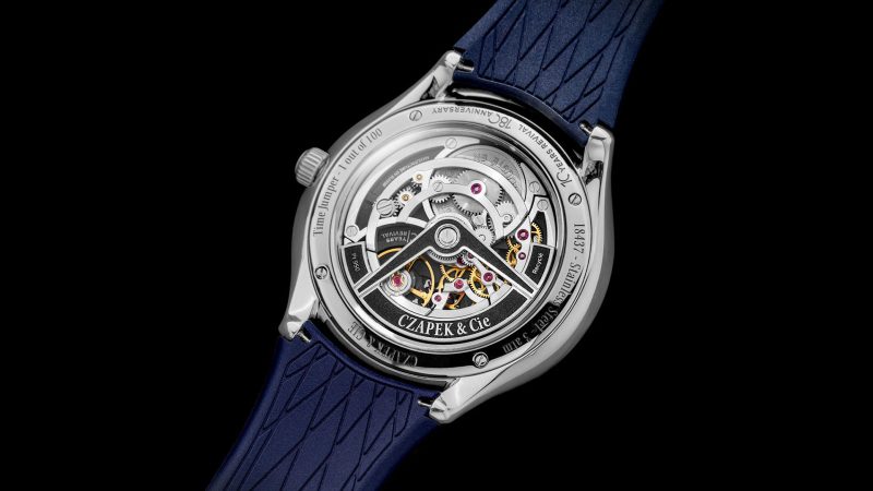 Czapek Time Jumper watch with jump-hour display, Singularité guilloché cover, caliber 10.01 movement, flying tourbillon, and stainless steel half-hunter case.