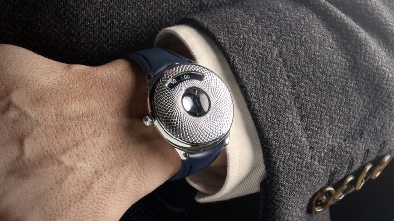 Czapek Time Jumper watch with jump-hour display, Singularité guilloché cover, caliber 10.01 movement, flying tourbillon, and stainless steel half-hunter case.