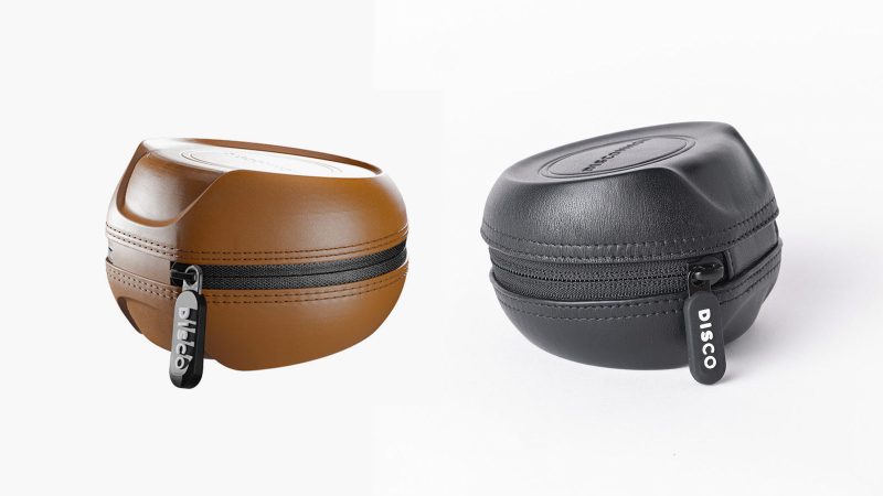 Discommon Goods The Puck watch case in wet-formed Napa leather, shown open and closed, highlighting its sculpted exterior and padded microfiber interior.