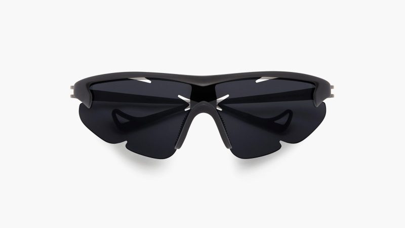 The District Vision x Post Archive Faction Junya Racer Sunglasses boast an ultralight wraparound frame, high-contrast performance lenses, futuristic sculptural design, and running-ready fit.