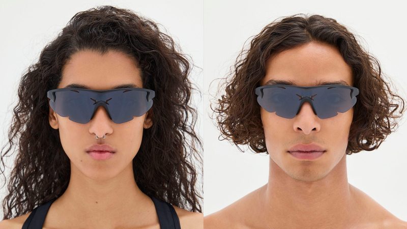 The District Vision x Post Archive Faction Junya Racer Sunglasses boast an ultralight wraparound frame, high-contrast performance lenses, futuristic sculptural design, and running-ready fit.