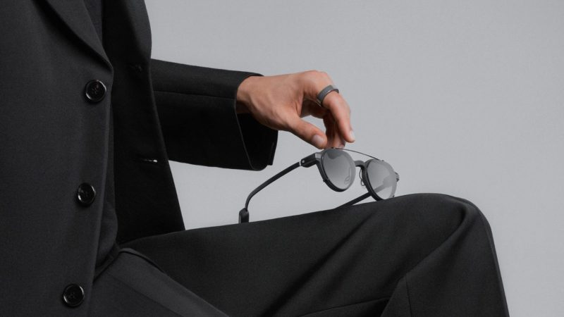 Even Realities G2 Smart Glasses and R1 Smart Ring boast a sleek titanium frame, minimalist design, and HUD waveguides visible.