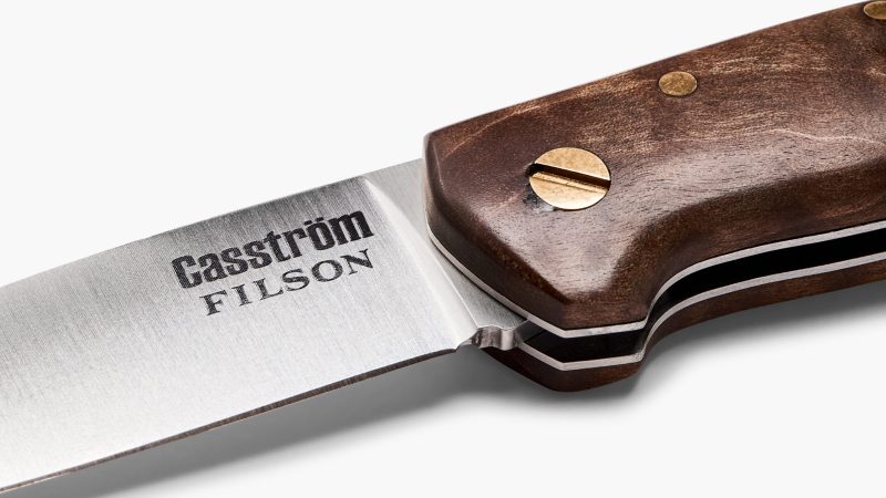 The Filson x Casström Lars Fält Folding Knife with a 3-inch 14C28N stainless lockback blade, quilted maple handle, compact EDC bushcraft folder for rugged outdoor use.