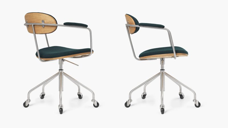 The Hans J. Wegner Swivel Chair, sculpted in wood and leather, showcases mid-century Danish design craftsmanship and ergonomic modern seating.