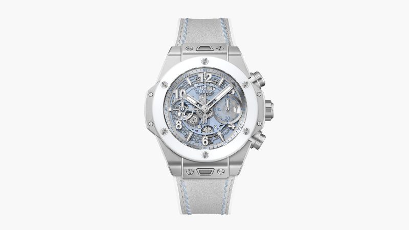 The Hublot Big Bang Unico Winter Titanium Ceramic 42 mm watch with microblasted titanium case, white ceramic bezel, glacier-blue skeleton dial, and UNICO flyback chronograph movement.