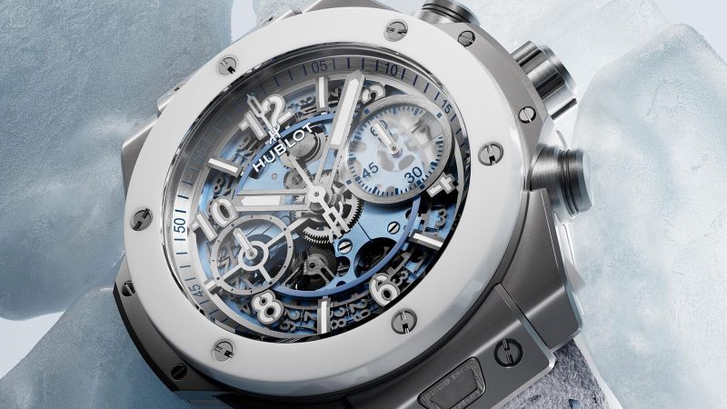 The Hublot Big Bang Unico Winter Titanium Ceramic 42 mm watch with microblasted titanium case, white ceramic bezel, glacier-blue skeleton dial, and UNICO flyback chronograph movement.
