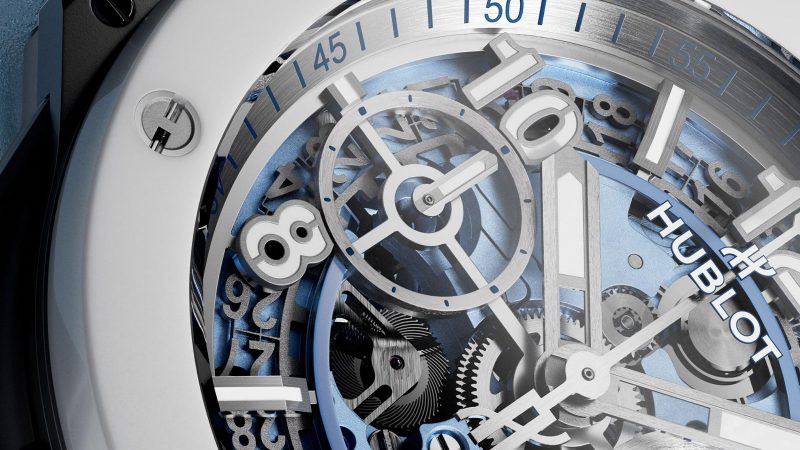 The Hublot Big Bang Unico Winter Titanium Ceramic 42 mm watch with microblasted titanium case, white ceramic bezel, glacier-blue skeleton dial, and UNICO flyback chronograph movement.