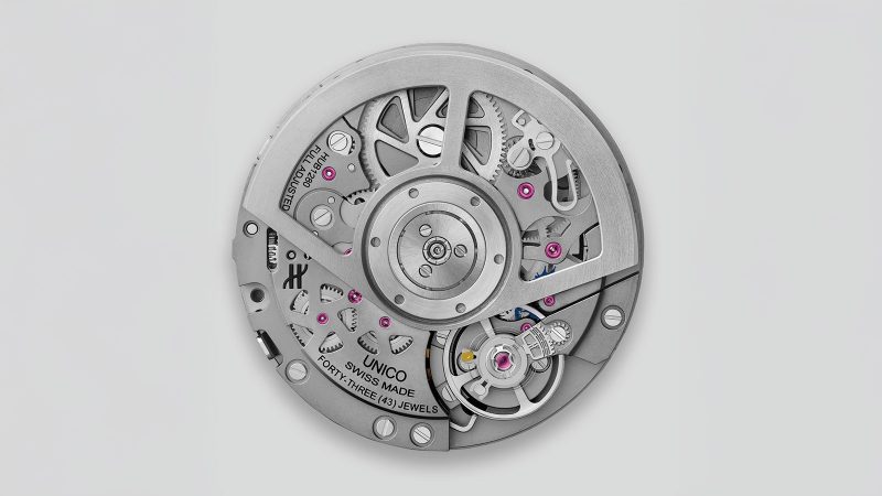 The Hublot Big Bang Unico Winter Titanium Ceramic 42 mm watch with microblasted titanium case, white ceramic bezel, glacier-blue skeleton dial, and UNICO flyback chronograph movement.