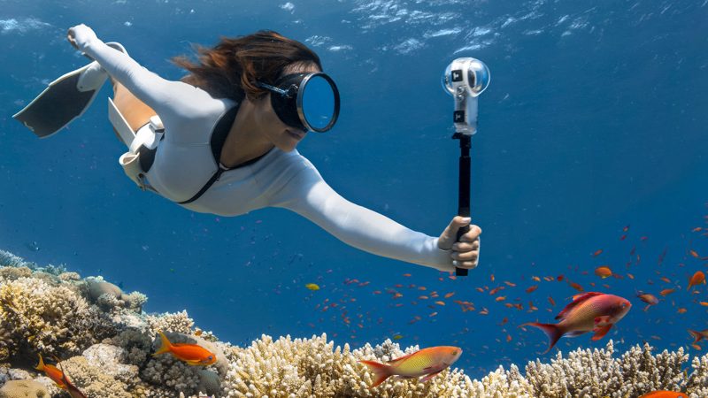 Insta360 X4 Air ultralight 360 camera in Graphite Black with dual lenses capturing 8K immersive video.