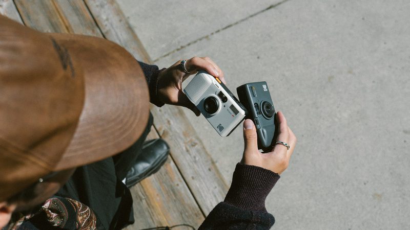 The Kodak Snapic A1 35mm film camera has a 25mm glass lens, multiple-exposure capability, and a retro-inspired design.