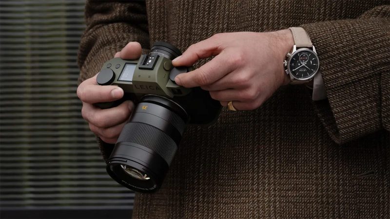 The Leica SL3 Reporter camera with dark green scratch-resistant finish and aramid fabric grip.