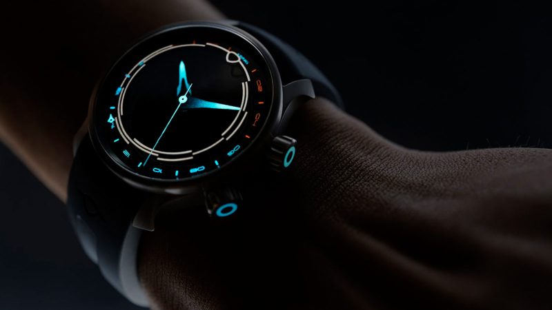 MING 37.11 Odyssey titanium GMT dive watch with smoked sapphire dial, rotating 24-hour ring, gradient-lumed hands, and titanium bracelet.