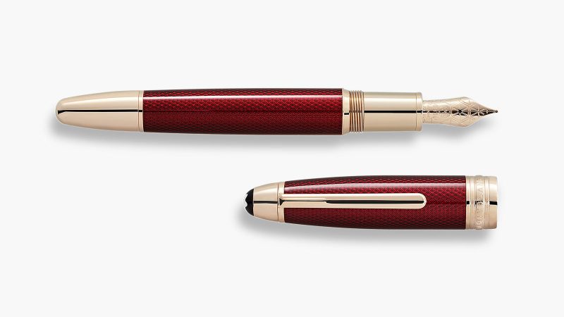 The Montblanc Meisterstück Solitaire Golden Hour luxury fountain pen has a gradient golden lacquer finish, gold-coated metal details, and premium Montblanc craftsmanship.