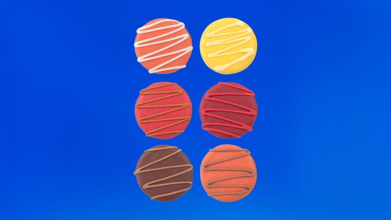 OREOiD Thanksgiving Dinner Cookie Tin features customizable OREO cookies decorated with festive Thanksgiving designs in a collectible holiday tin.