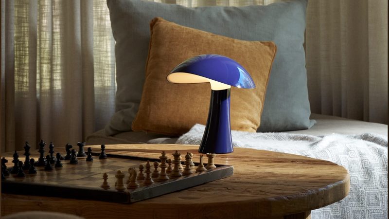 The Rumee 220 Portable Lamp in sculptural asymmetric form, designed by Gabriel Tan with soft ambient 360-degree glow.