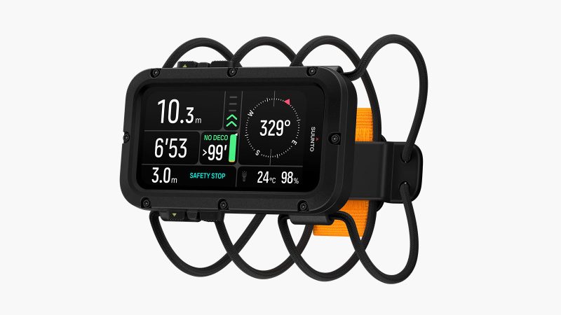 Suunto Nautic and Nautic S dive computers—large AMOLED display model and compact model—with rugged straps and deep-ocean interface styling.