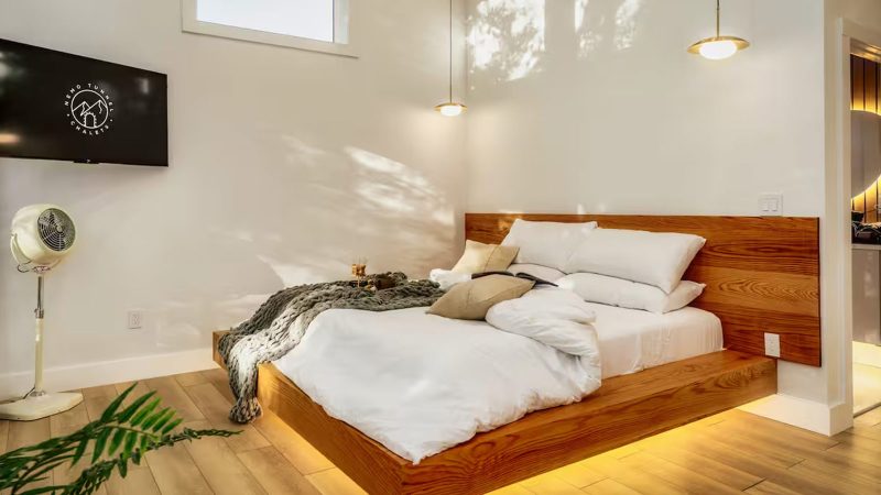 The Solenne Airbnb is a modern forest retreat features warm neutral tones, architectural clean lines, panoramic windows, and curated interior design.
