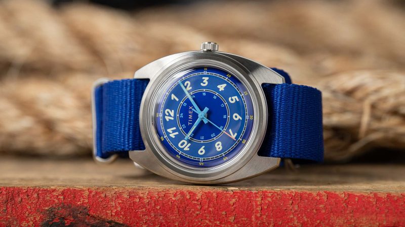 The Timex x Worn & Wound Field Watch w/a Twist in Whirlpool and Storm colorways features a bold, sector-style dial with italic numerals and luminous detailing.