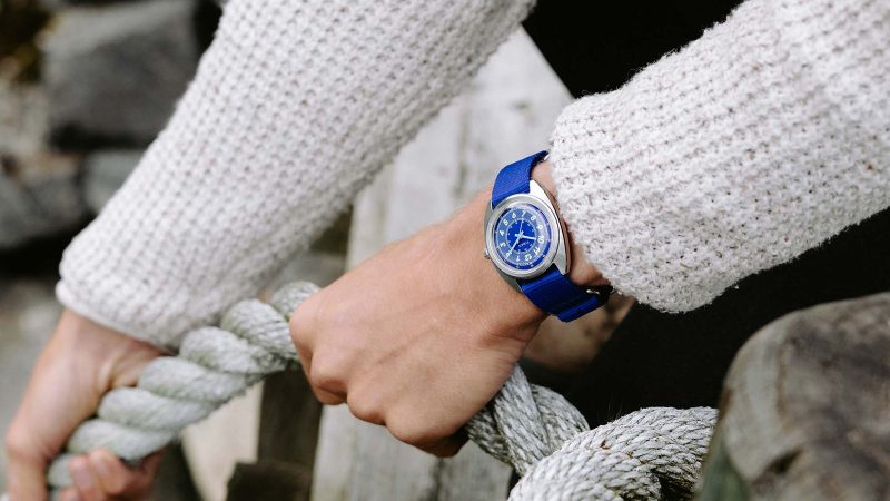 The Timex x Worn & Wound Field Watch w/a Twist in Whirlpool and Storm colorways features a bold, sector-style dial with italic numerals and luminous detailing.