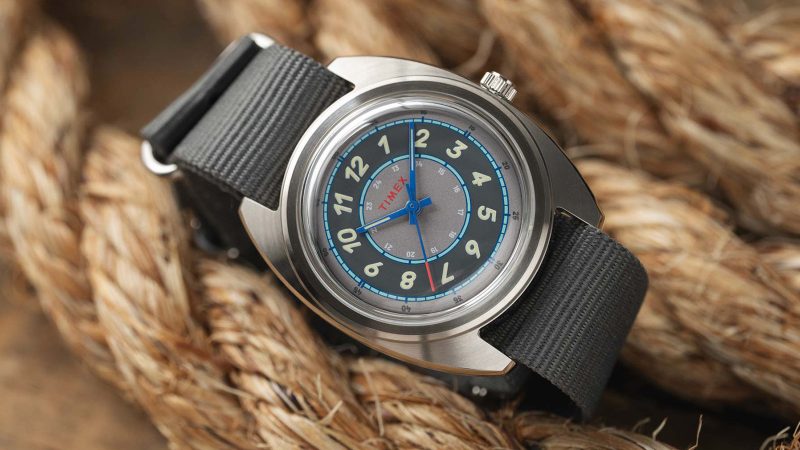 The Timex x Worn & Wound Field Watch w/a Twist in Whirlpool and Storm colorways features a bold, sector-style dial with italic numerals and luminous detailing.