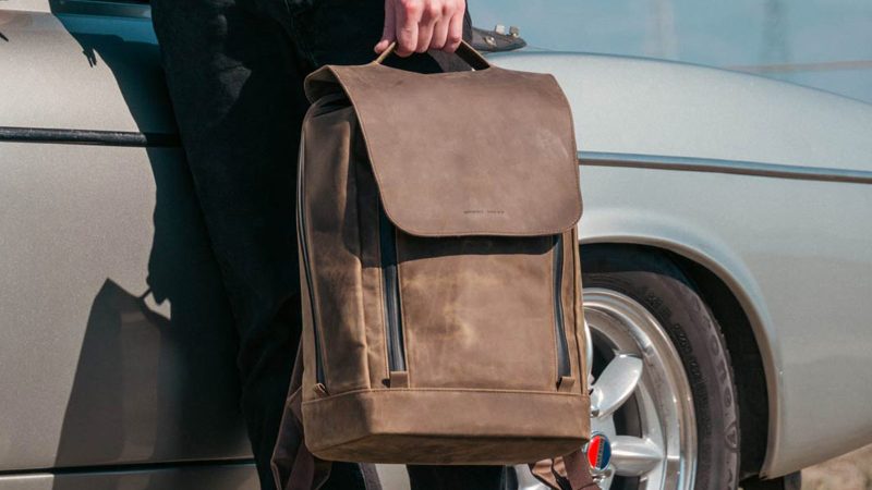 The WaterField Bowery Leather Backpack is handmade in San Francisco with full-grain leather, a magnetic Fidlock buckle, padded laptop and tablet compartments, water-resistant zippers, and a gold-lined interior.