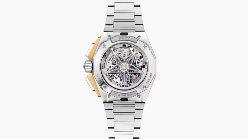 The Zenith DEFY Extreme Lapis Lazuli watch features a 45mm steel case with gold accents, a lapis stone dial, an openworked El Primero 9004 movement, and an included strap set.