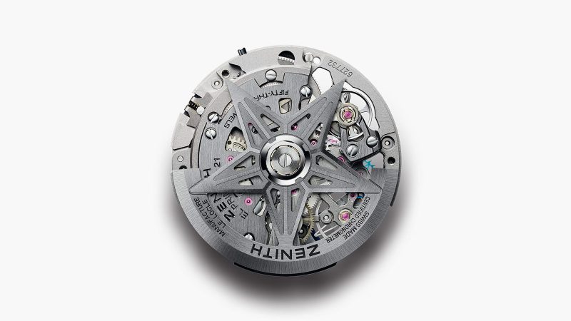 The Zenith DEFY Extreme Lapis Lazuli watch features a 45mm steel case with gold accents, a lapis stone dial, an openworked El Primero 9004 movement, and an included strap set.