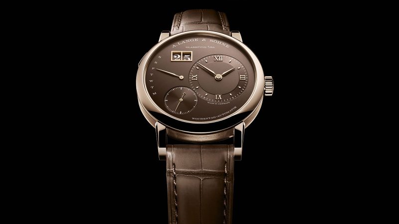 A. Lange & Söhne LANGE 1 DAYMATIC Honeygold limited edition watch featuring a Honeygold case, brown dial, retrograde day display, and caliber L021.1 movement.