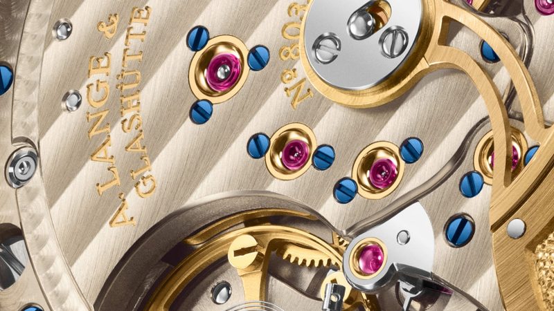 A. Lange & Söhne LANGE 1 DAYMATIC Honeygold limited edition watch featuring a Honeygold case, brown dial, retrograde day display, and caliber L021.1 movement.