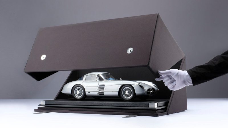 The Amalgam Collection scale model of the Mercedes‑Benz 300 SLR Uhlenhaut Coupe features ultra-detailed craftsmanship, silver bodywork, and historically accurate automotive design.