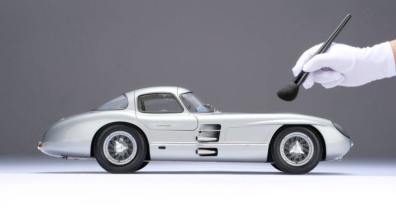 The Amalgam Collection scale model of the Mercedes‑Benz 300 SLR Uhlenhaut Coupe features ultra-detailed craftsmanship, silver bodywork, and historically accurate automotive design.